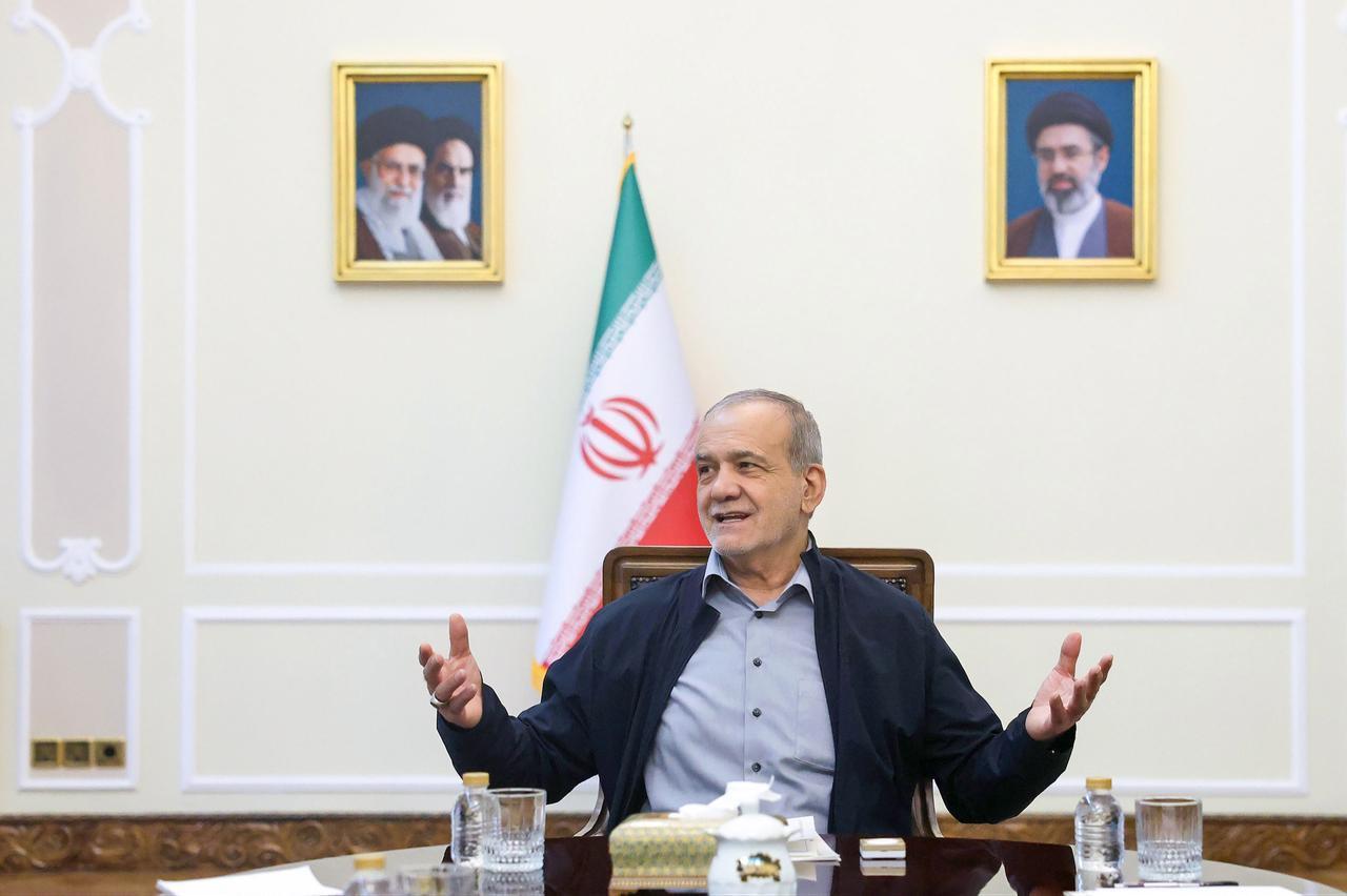 Iranian President Masoud Pezeshkian meets with Parliament Speaker Mohammad Bagher Ghalibaf and Judiciary Chief Gholamhossein Mohseni-Ejei in Tehran, Iran on Oct. 11, 2026. (Iranian Presidency/Handout)