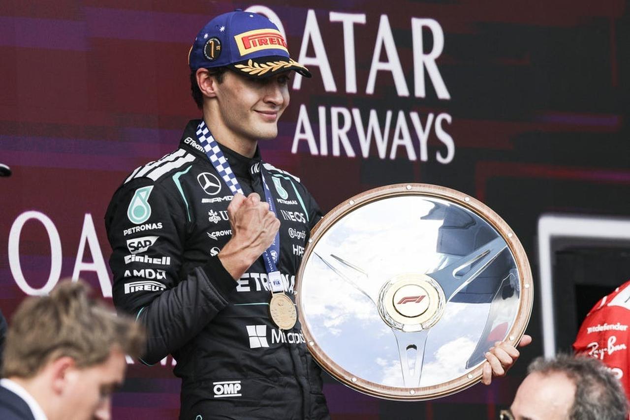 George Russell of the Mercedes AMG F1 Team celebrates on the podium ahead of the Australian Grand Prix in Melbourne, Australia, March 8, 2026. (AFP Photo)