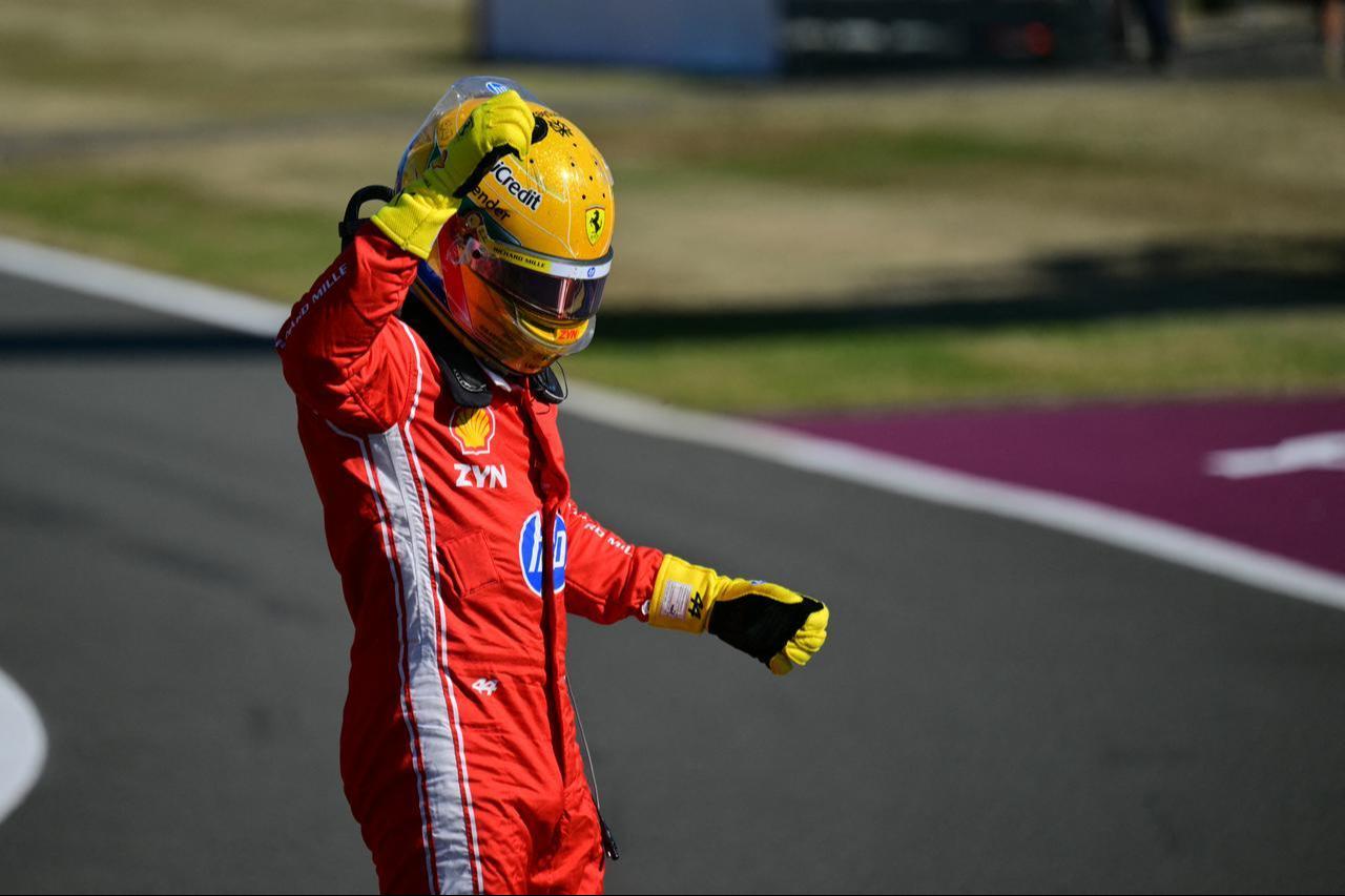 Ferrari's British driver Lewis Hamilton celebrates his pole position after the sprint qualifying session ahead of the Formula One British Grand Prix at the Silverstone motor racing circuit in Silverstone, central England, July 3, 2026. (AFP Photo)