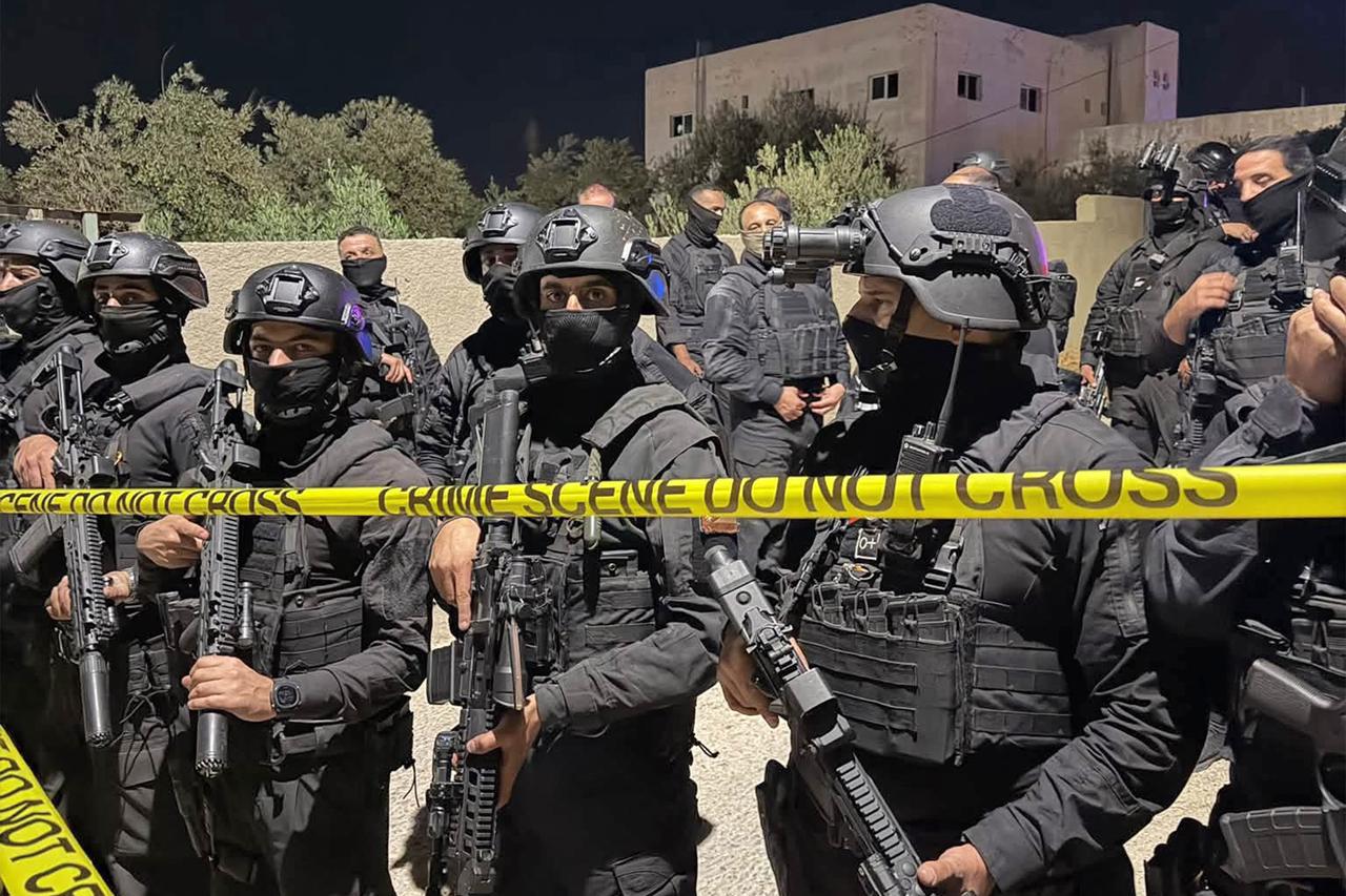 This handout picture released by Jordan's General Security Directorate shows members of the security forces in the village of al-Jadeeda in Karak governorate on October 26, 2026, while preparing for an operation to detain suspects in the October 23 attack on the St George church in Hammoud. (Photo by Jordan's General Security Directorate / AFP)