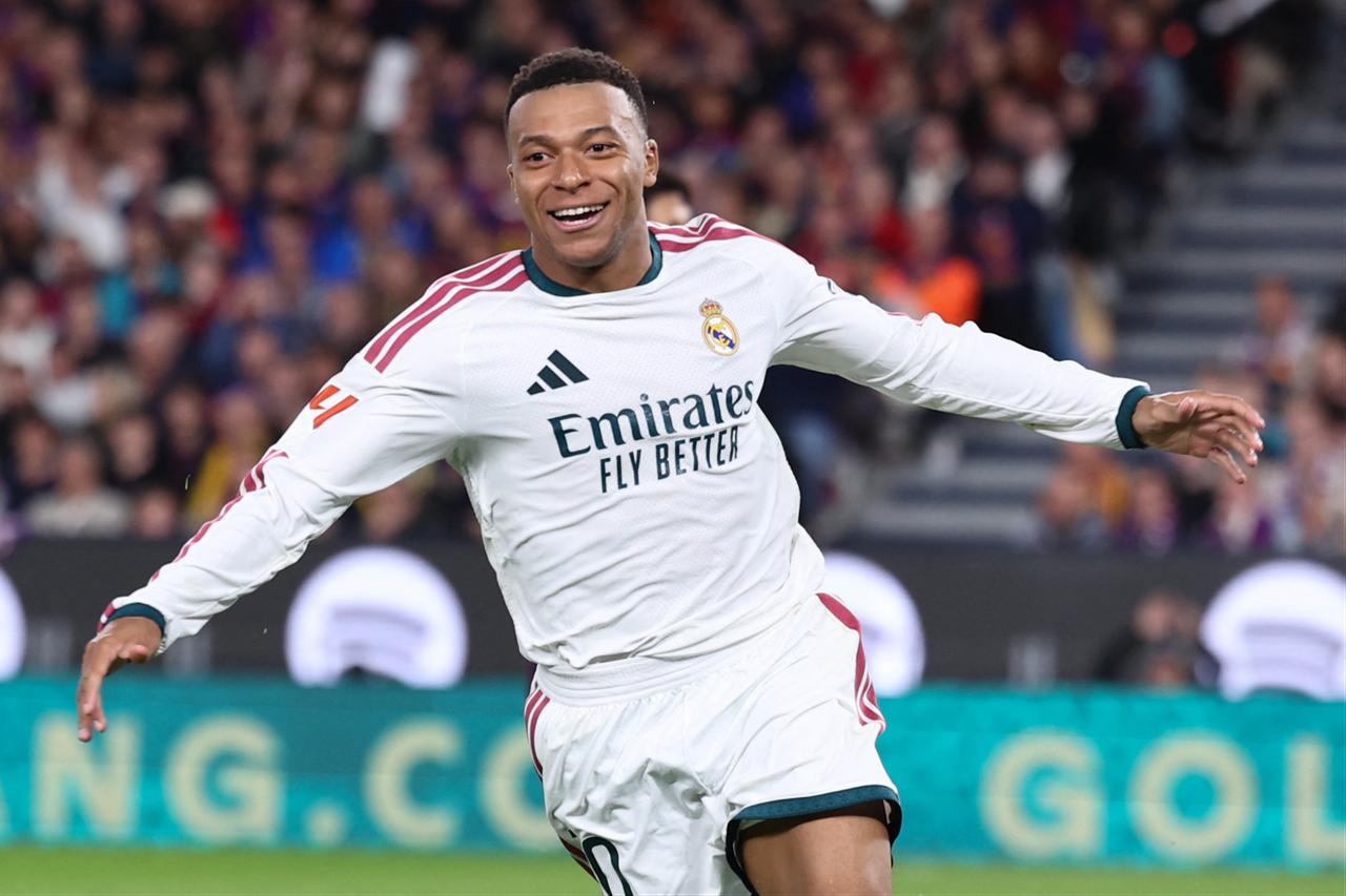 Real Madrid's French forward #10 Kylian Mbappe celebrates scoring his team's second goal during the Spanish league football match between FC Barcelona and Real Madrid CF at Camp Nou Stadium in Barcelona on October 25, 2026. (AFP Photo)