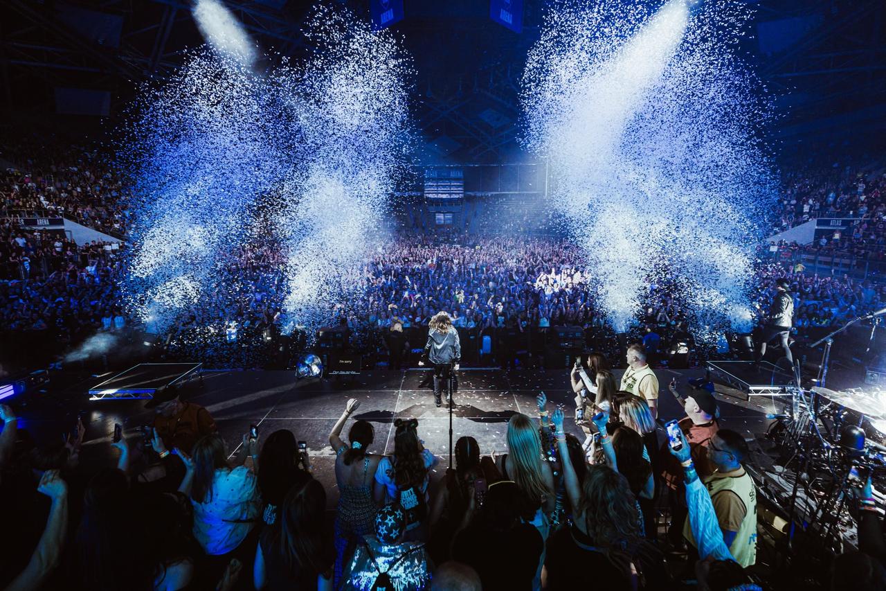 American rock band Thirty Seconds to Mars performs in front of a large crowd as confetti fills the arena during a concert at Atlas Arena in Lodz, Poland. (Photo via Facebook/Thirty Seconds to Mars)