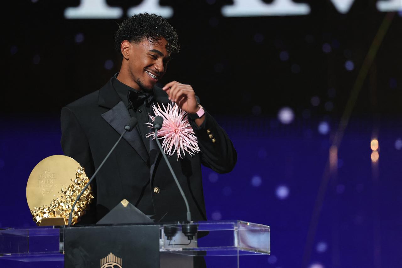 Spain and Barcelona forward Lamine Yamal speaks after winning the Trophy for the Men's Young Talent of the Year during the 2026 Ballon d'Or France Football award ceremony at the Palladium Theatre in London on October 26, 2026. (AFP Photo)