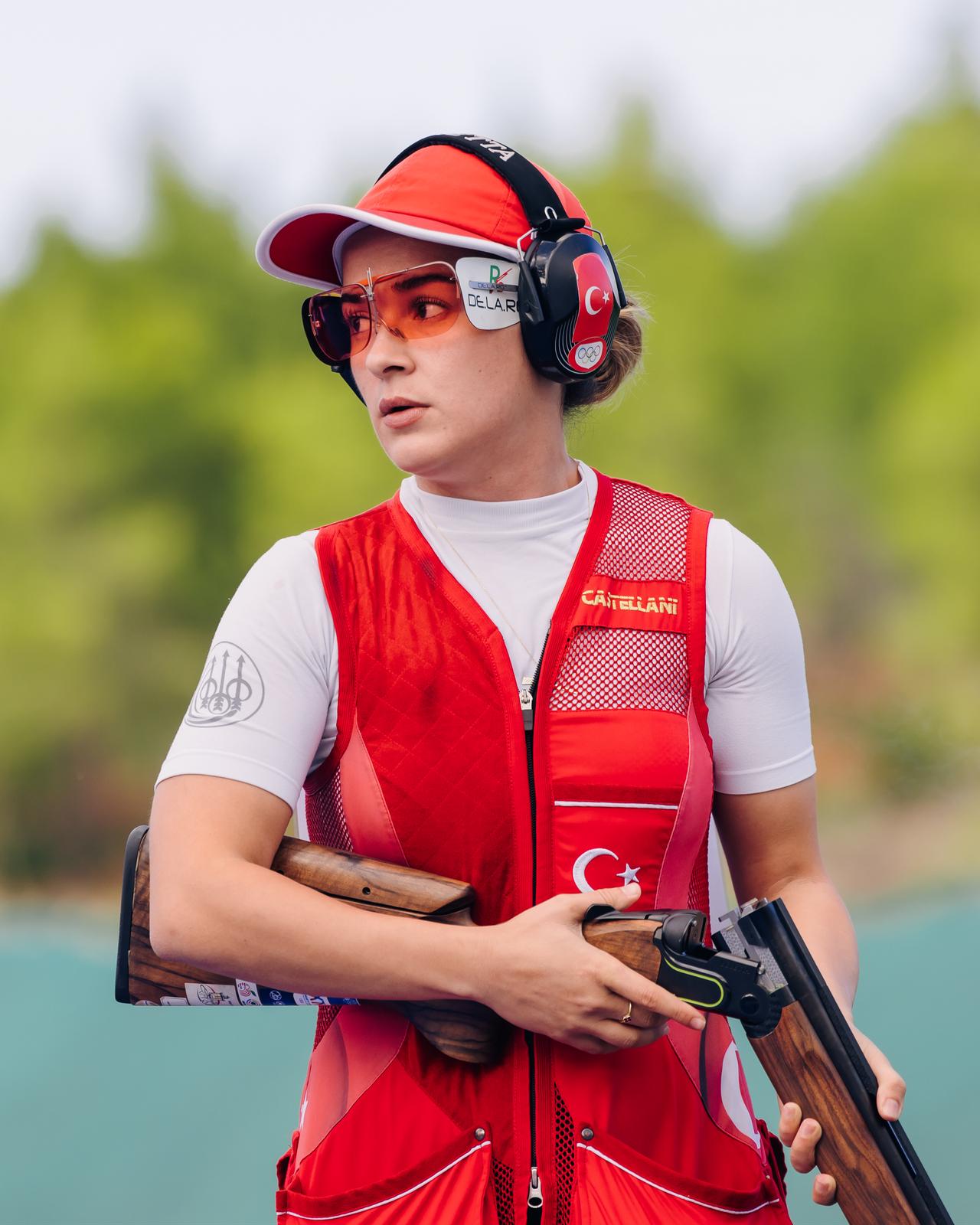 Turkish trap athlete Rumeysa Pelin Kaya preparing for a round at the shooting range, fitted with eye protection and ear muffs. (Photo via European Shooting Confederation)