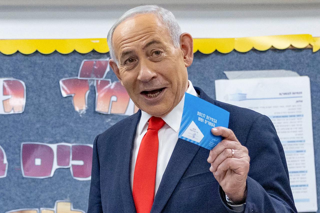 Israel's Prime Minister Benjamin Netanyahu reacts before casting his ballot to vote at a polling station in Jerusalem on October 27, 2026. (AFP Photo)