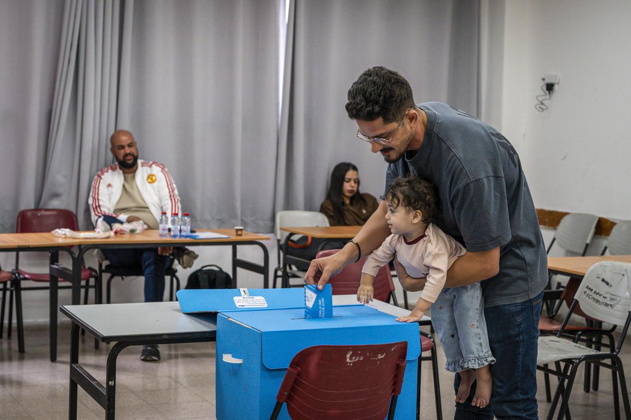 Arab voters who are Israeli citizens cast their ballots at a polling station in Nazareth, Israel, during the general elections on October 27, 2026. (AA Photo)