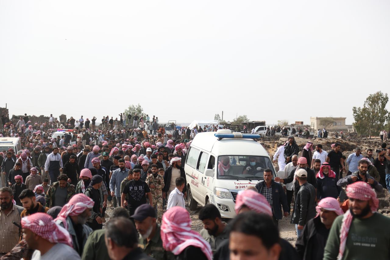 People from different villages of Deraa attend the funeral held for those who were killed in a nighttime airstrike carried out by Jordanian warplanes, in the As-Sanamayn area of Deraa, Syria, on October 27, 2026. (AA Photo)