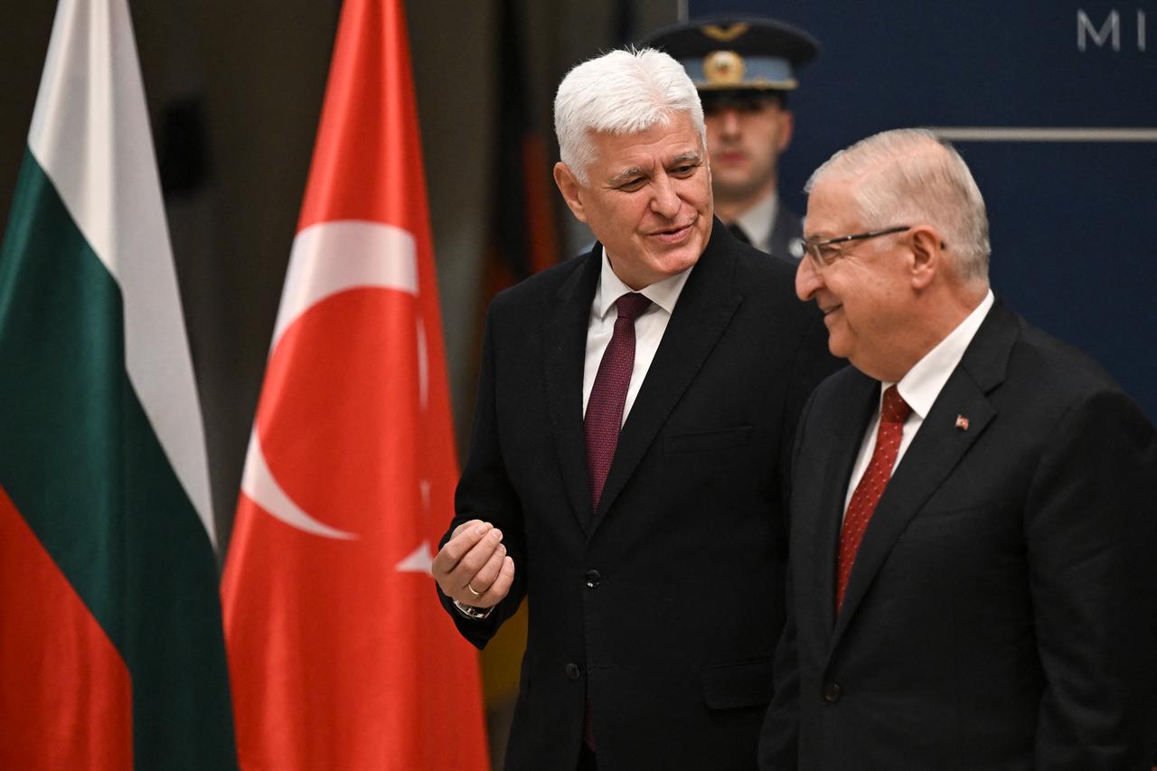 Bulgarian Defence Minister Dimitar Stoyanov (L) speaks with Turkish Defence Minister Yasar Guler prior to a trilateral meeting on 'Black Sea security' in Sofia on Oct. 28, 2026. (AFP Photo)