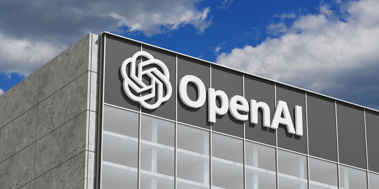 An OpenAI logo is displayed on the exterior of a modern office building. (Adobe Stock Photo)