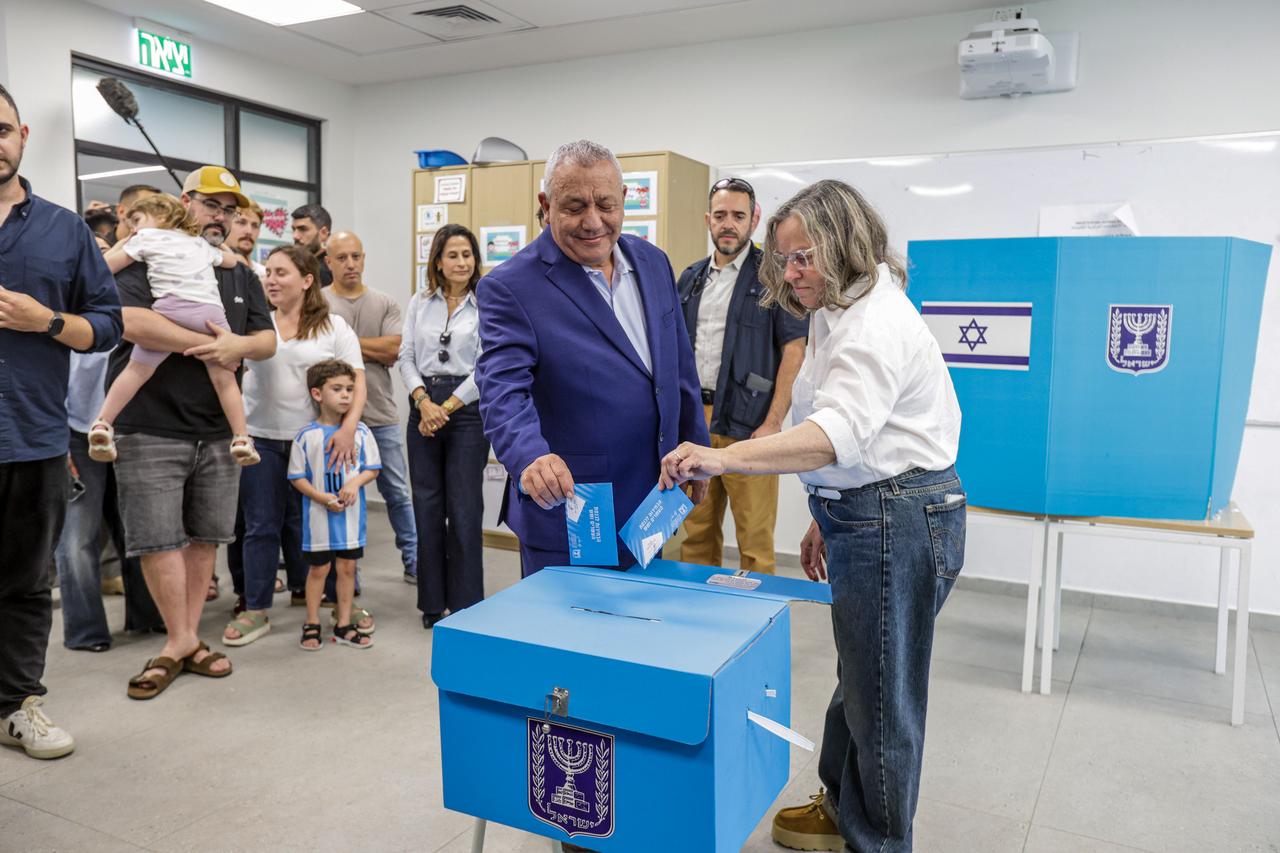 Former Israeli military chief and Yashar Party leader Gadi Eisenkot (L) and his wife Hanna Eisenkot (R) cast their ballot at a school in Herzliya, as voters head to the polls in Israel's general elections, in Tel Aviv, Israel on October 27, 2026. (AA Photo)