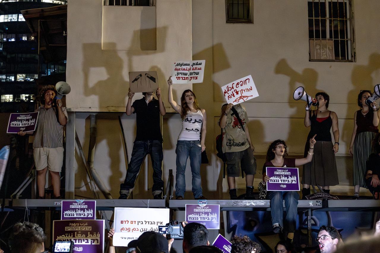 Left-wing Israelis gather to demand a joint government of Arabs and Jews and block roads in Tel Aviv, Israel on October 28, 2026. (AA Photo)