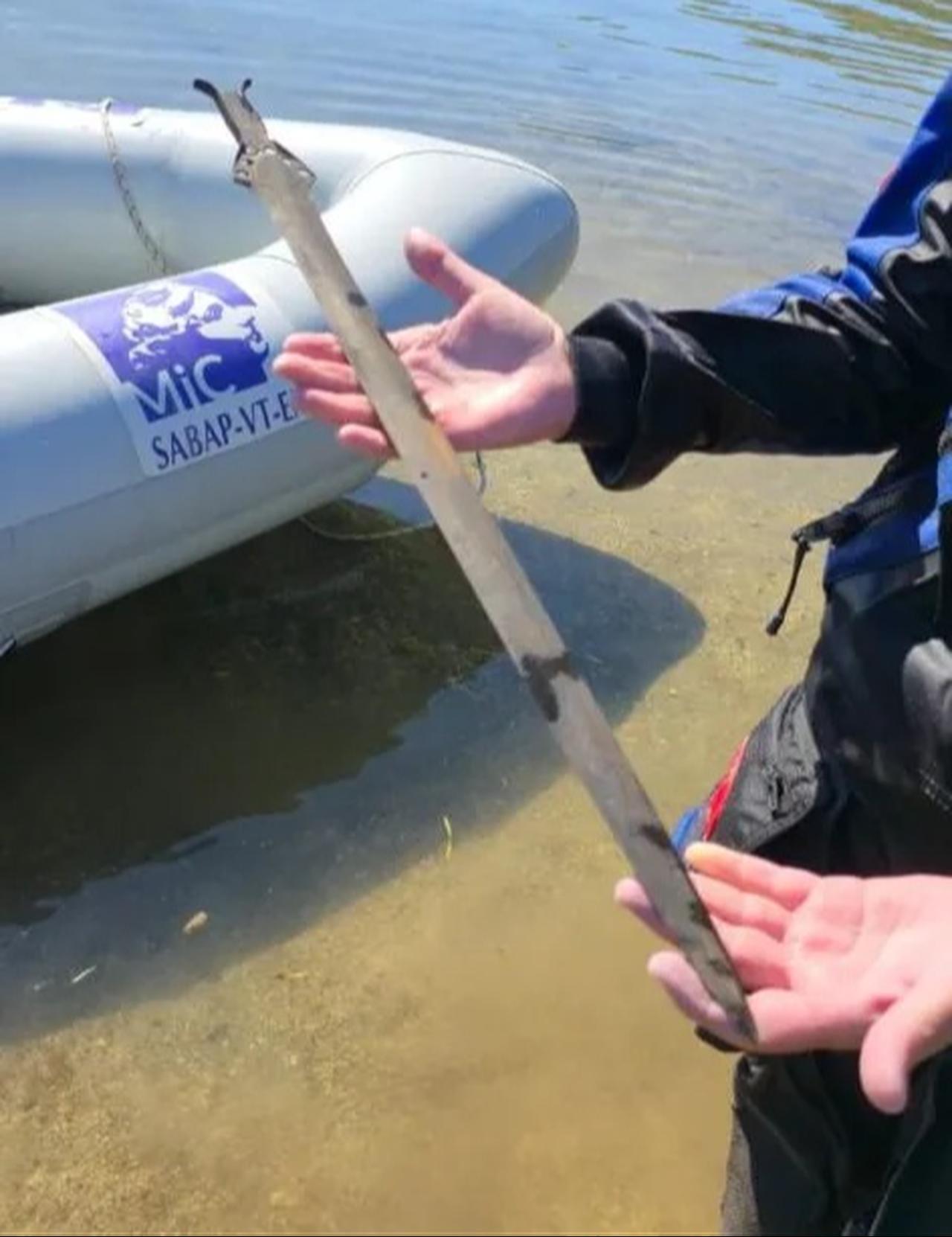 a well-preserved bronze sword discovered by archaeologists in a lake in Italy. (Photo courtesy of the Superintendence of Archaeology, Fine Arts and Landscape for the Province of Viterbo and Southern Etruria)