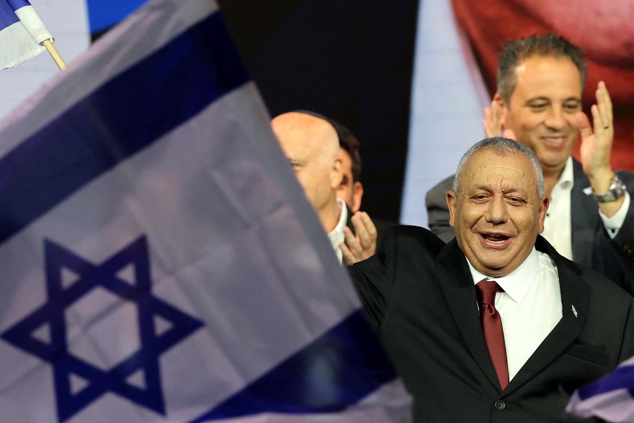 Yashar party leader Gadi Eisenkot greets his supporters at the election night rally after the first exit polls were announced, in Tel Aviv on early October 28, 2026, during Israel's legislative elections. (AFP Photo)