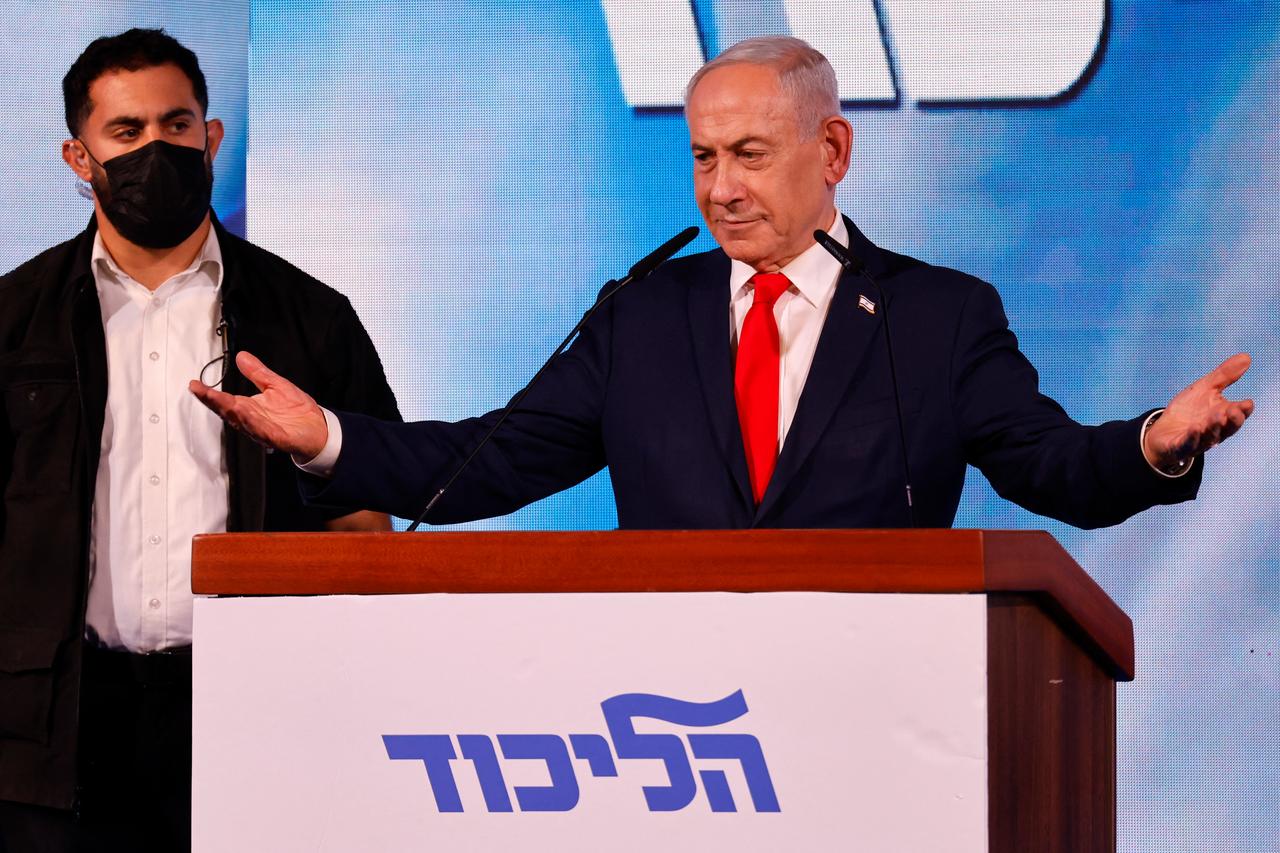 Israel's Prime Minister Benjamin Netanyahu addresses his supporters at the election night rally after the first exit polls were announced, in Jerusalem on early October 28, 2026, during Israel's legislative elections. (AFP Photo)