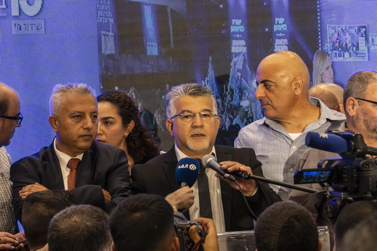 Yousef Jabareen, leader of the Joint List party, delivers a speech as supporters celebrate after the exit polls announcement following the closing of poll stations for the Israeli general election, at the Joint List headquarters in Nasserah, Israel on Oct. 27, 2026. (AA Photo)