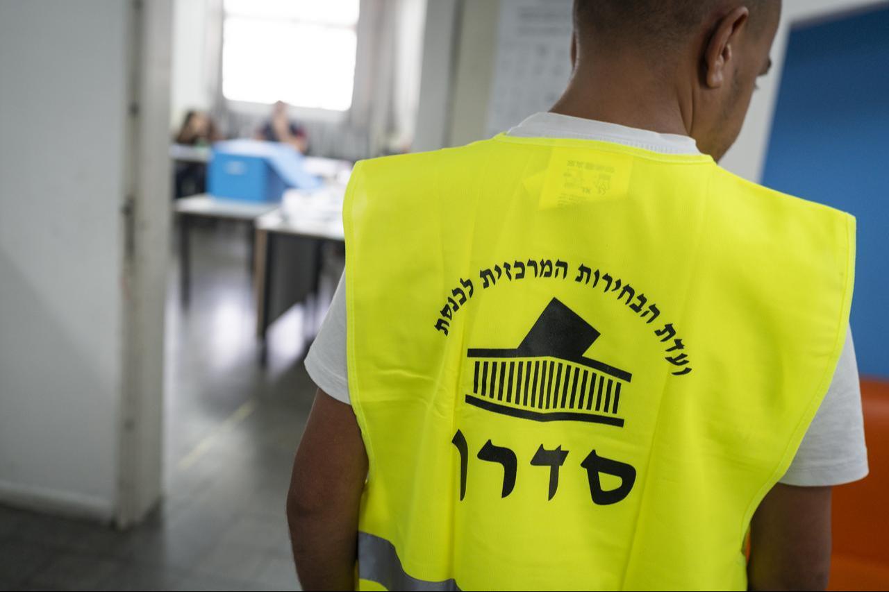 Election officials wait as Arab voters, who are Israeli citizens cast their ballots as part of the general election in Nazareth, Israel on October 27, 2026. (AA Photo)