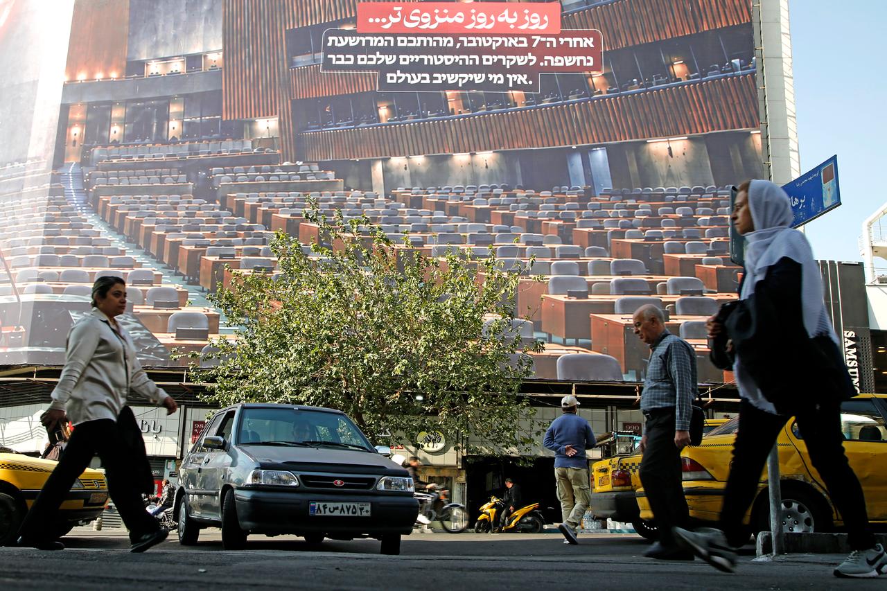 A view from Tehran, Iran, as people go about their daily activities while anti-Israel banners are displayed in major squares across the capital, amid ongoing discussions over Israel's general elections and the Israeli government's policies toward Iran, on October 27, 2026. (AA Photo)