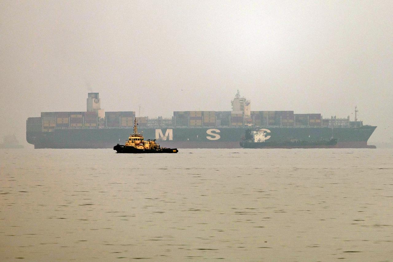 A vessel transits the Gulf of Oman off the coast of Khor Fakkan in the emirate of Sharjah in the east of the UAE on October 13, 2026. (AFP Photo)