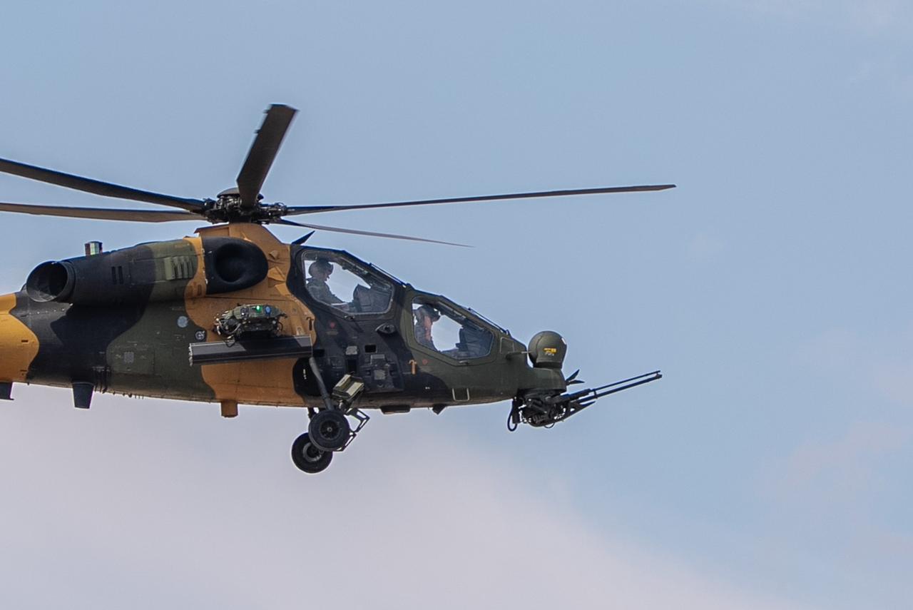 T129 ATAK military helicopter conducts a low-pass formation flight during Teknofest Southeast at Sanliurfa GAP Airport in Sanliurfa, Türkiye, on October 4, 2026. (AA Photo)