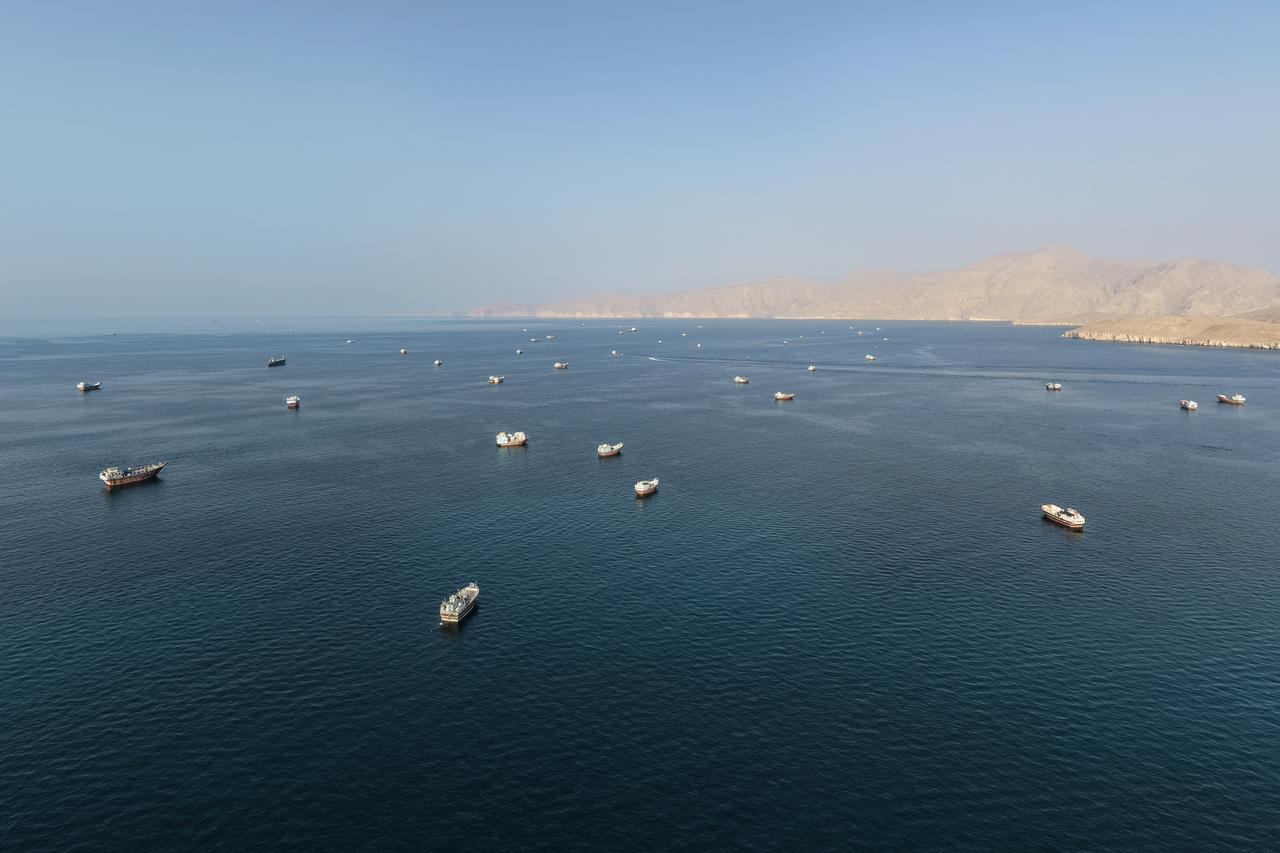An aerial view shows ships anchored off the coast of Khasab in Oman’s Musandam Governorate, near the Strait of Hormuz, on October 2, 2026. (AFP Photo)