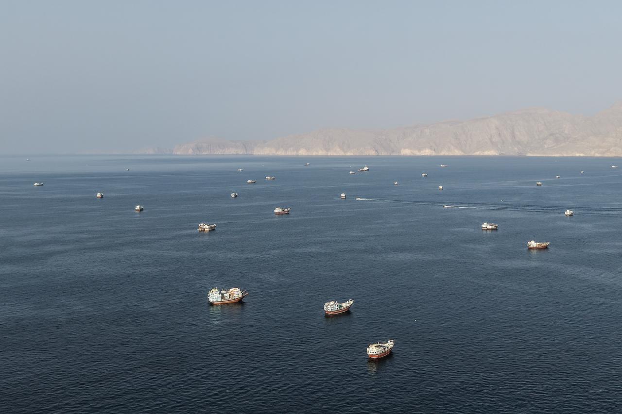 An aerial view shows ships anchored off the coast of Khasab in Oman’s Musandam Governorate, near the Strait of Hormuz, on October 2, 2026. (AFP Photo)