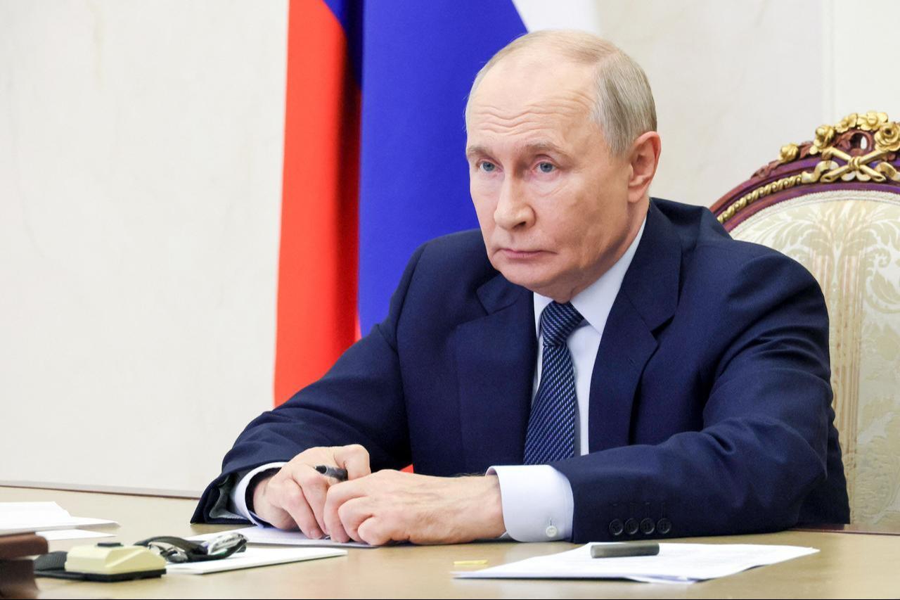 In this pool photograph distributed by the Russian state agency Sputnik, Russia's President Vladimir Putin holds a meeting of Russia's Security Council in Moscow on September 4, 2026. (Photo by Sputnik / AFP)
