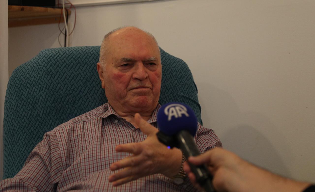Ibrahim Sunar, a 77-year-old first-generation Turkish guest worker from Adana, gestures during an interview in Berlin, Germany, on the 65th anniversary of the 1961 Labor Recruitment Agreement, Oct. 30, 2026. (AA Photo)