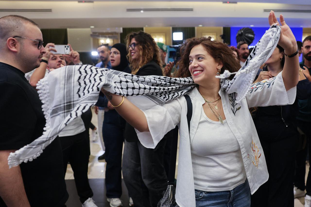 Supporters of Israel's Arab-led Joint List political alliance cheer at the alliance's campaign headquarters in the northern Israeli city of Nazareth on October 27, 2026. (AFP Photo)
