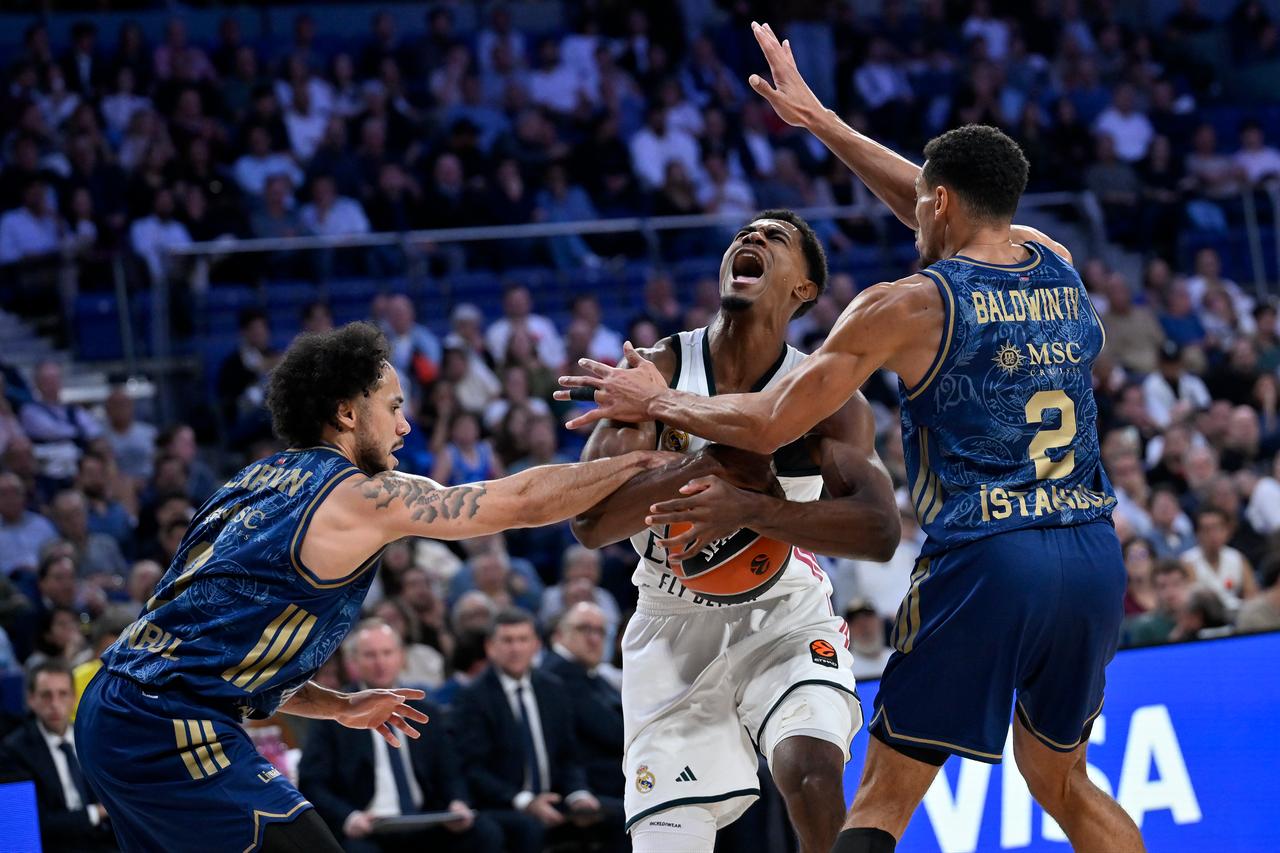 Shane Larkin of Fenerbahce Tarfin in action against Theo Maledon of Real Madrid during EuroLeague week 9 basketball match between Real Madrid and Fenerbahce Tarfin at Movistar Arena in Madrid, Spain on October 29, 2026. (AA Photo)