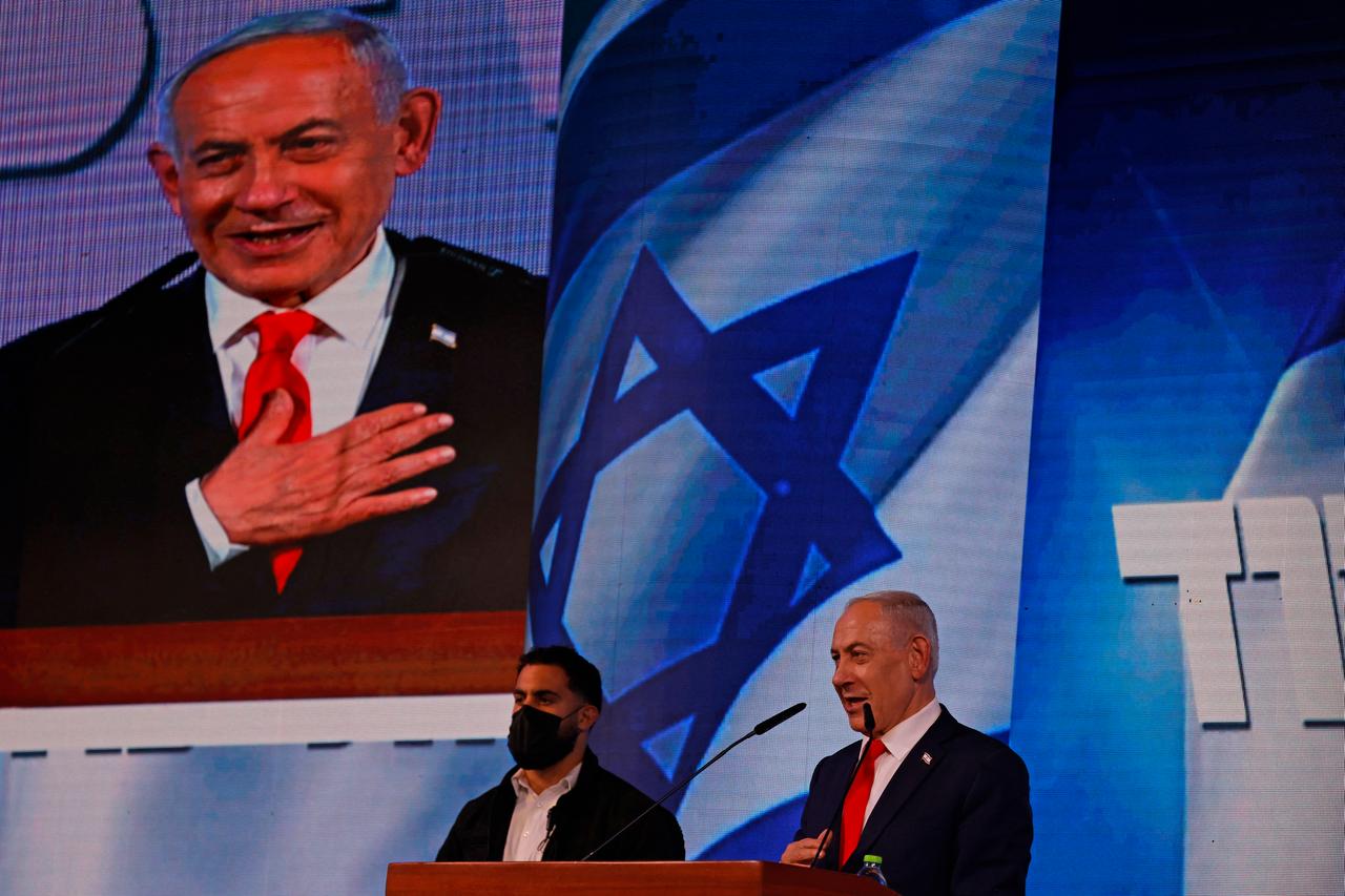 Israel's Prime Minister Benjamin Netanyahu addresses his supporters at the election night rally after the first exit polls were announced, in Jerusalem on early October 28, 2026. (AFP Photo)
