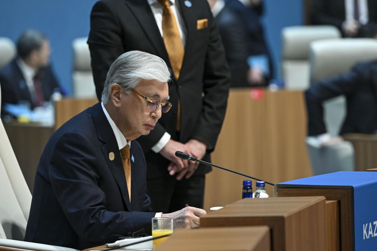 Kazakh President Kassym-Jomart Tokayev signs the joint declaration of the 13th Summit of the Council of Heads of State of the Organization of Turkic States (OTS) at the Bestepe Nation’s Exhibition Hall in Ankara, Türkiye on Friday, Oct. 30, 2026. (AA Photo)