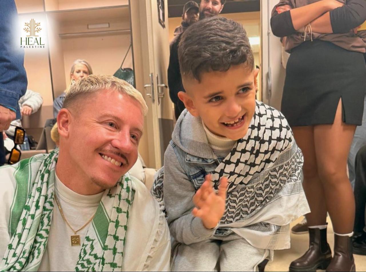 Macklemore ended his Free Palestine tour meeting Gaza youth in Paris. (Photo via X/@healpalestine_)