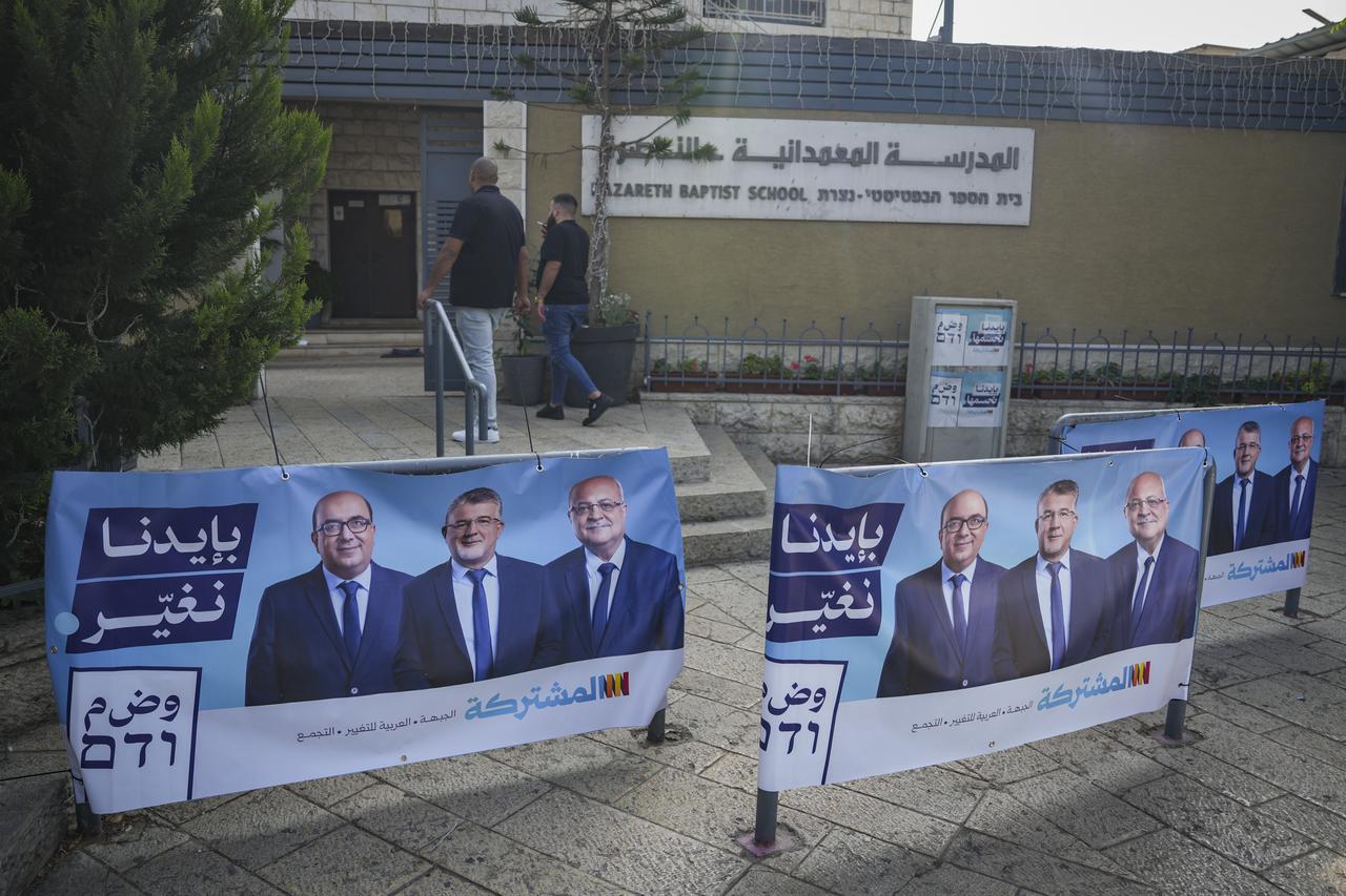 A poster featuring candidates from the United Arab List is hung in front of a polling station as part of the general election in Nazareth, Israel on October 27, 2026. (AA Photo)