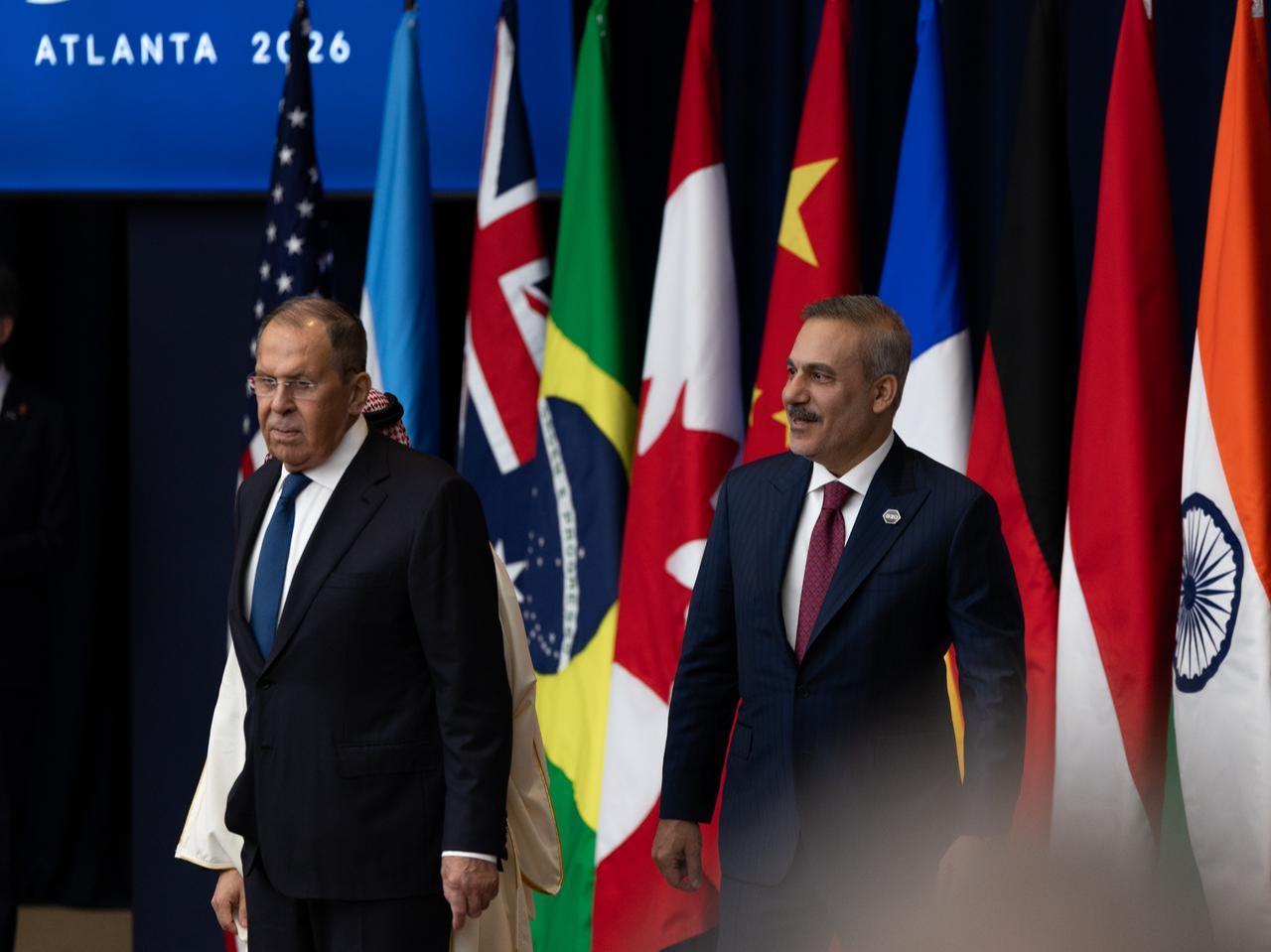 Turkish Foreign Minister Hakan Fidan (R), and Russian Foreign Minister Sergey Lavrov (L) attend the first plenary session at the G20 foreign ministers' meeting in Atlanta, GA, United States, October 30, 2026. (AA Photo)