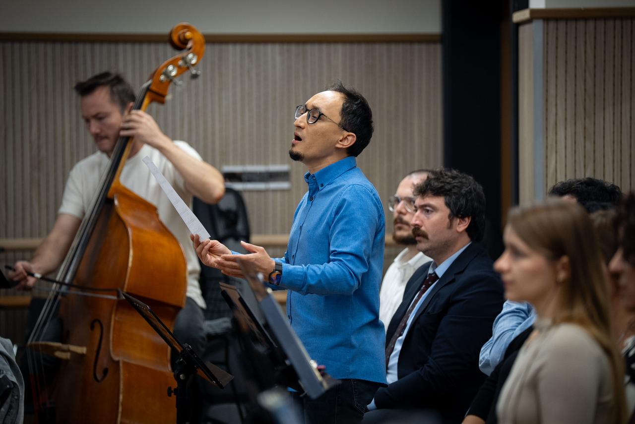 A vocalist rehearses with musicians from Ankara Music and Fine Arts University's new orchestra, which combines Turkish and Western musical instruments, Ankara, Türkiye, Oct. 4, 2026. (AA Photo)