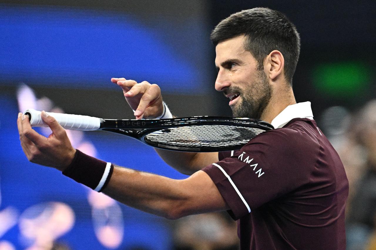 Djokovic breaks Nadal record with 32nd straight China Open win