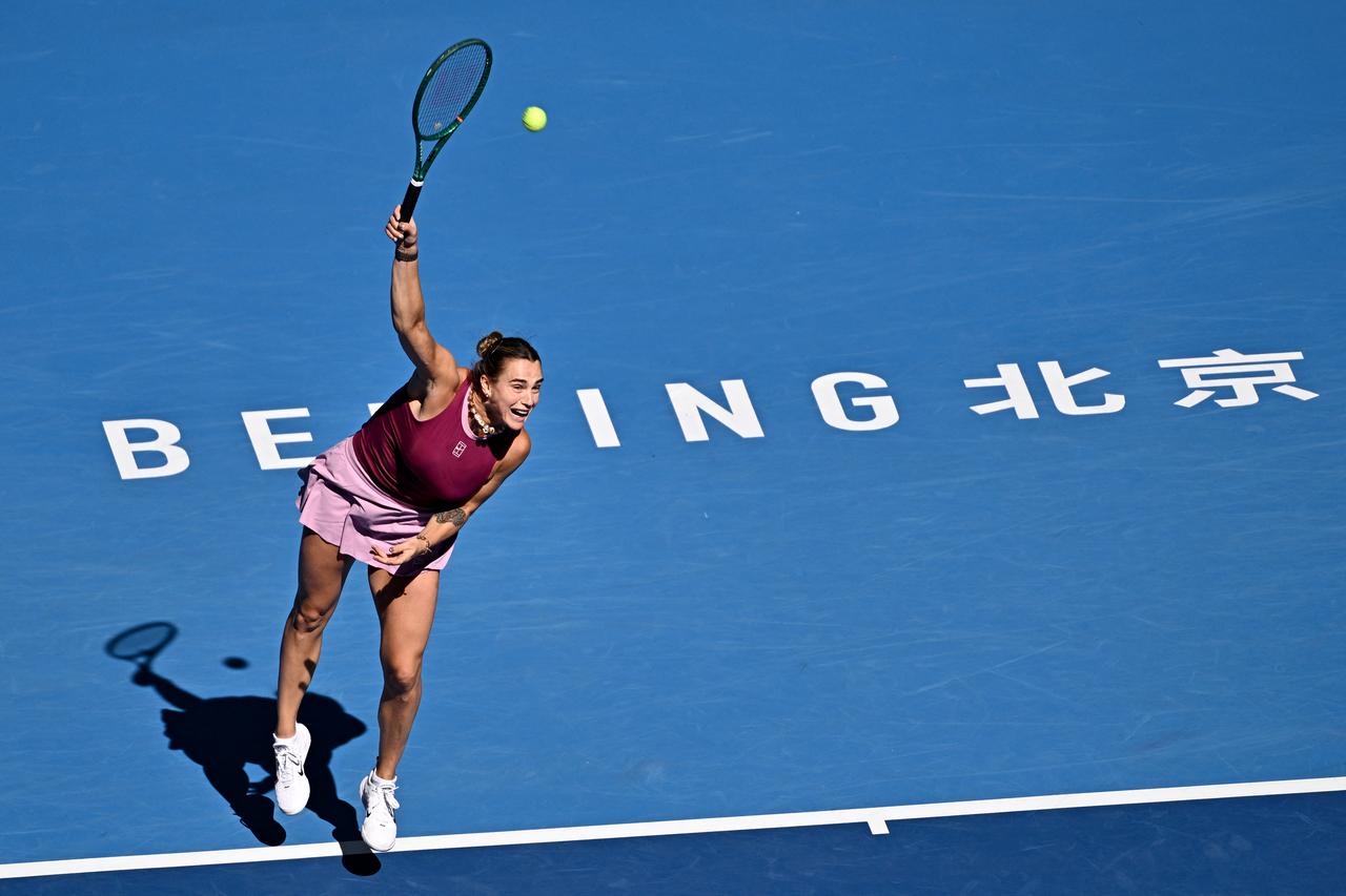 Belarus's Aryna Sabalenka serves to Czech Republic's Nikola Bartunkova during their women's singles match at the China Open tennis tournament in Beijing on October 4, 2026. (AFP Photo)