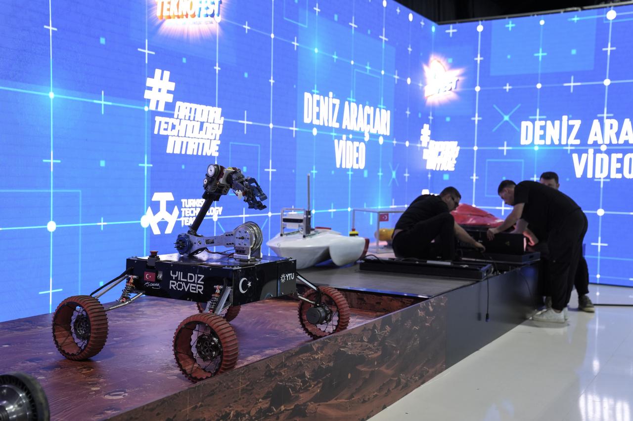 A Yildiz Rover and unmanned vehicle prototypes are displayed during preparations for the 77th International Astronautical Congress in Antalya, Türkiye, Oct. 4, 2026. (AA Photo)