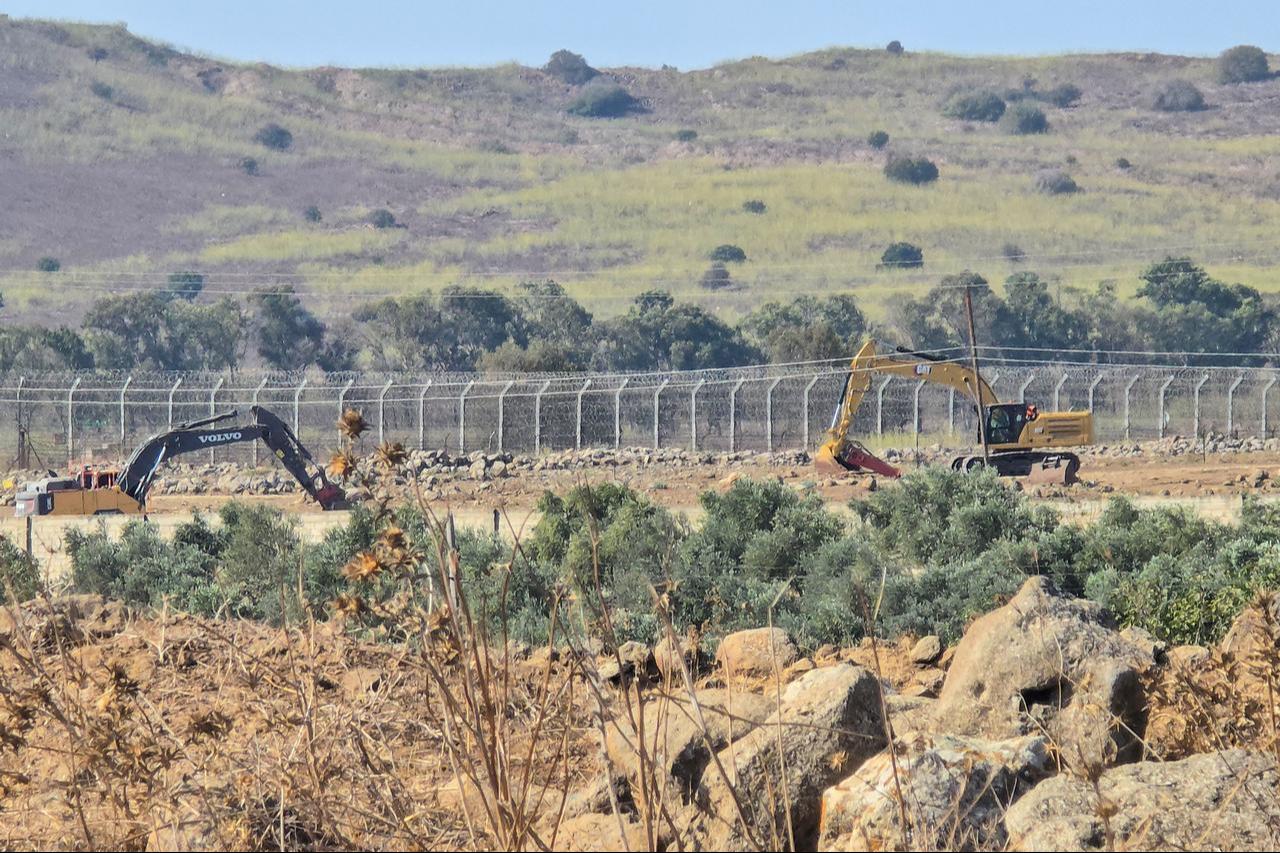 Israeli forces continue excavation activities with heavy machinery west of the village of Ashshe as part of the "Sufa 53" project, in Quneitra, Syria, on October 4, 2026. (AA Photo)