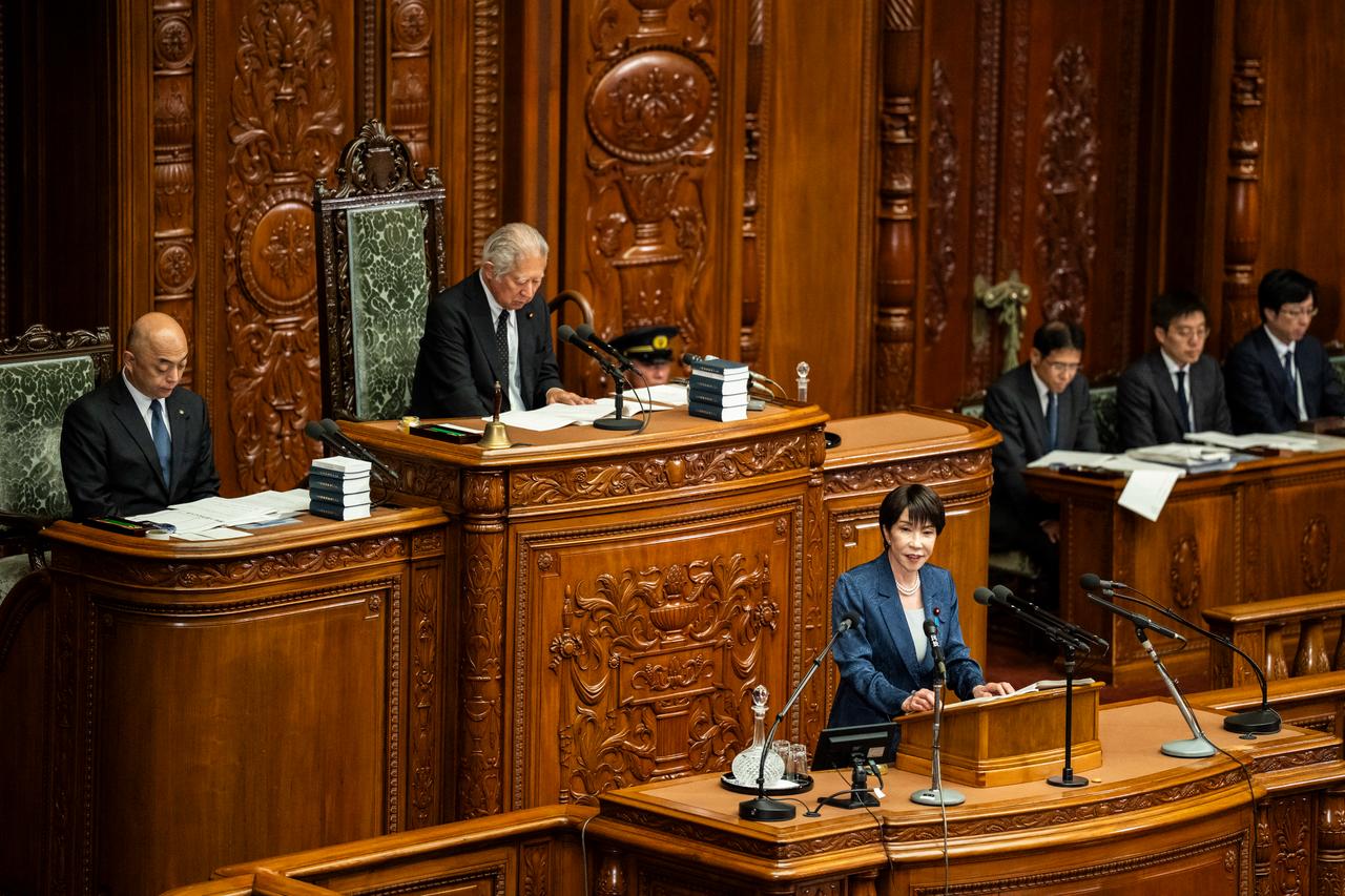Japan's Prime Minister Sanae Takaichi (3rd L) delivers a speech during a plenary session of the House of Representatives at the National Diet in Tokyo on October 5, 2026. (AFP Photo)