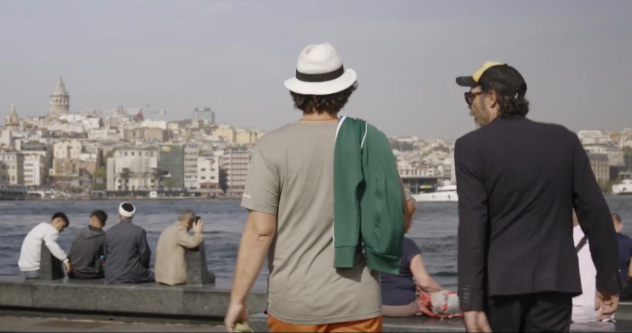 Mathias Mlekuz and Philippe Rebbot look across the Golden Horn toward Galata Tower during their time in Istanbul in "A Bicyclette!." (Image via M.E.S. Productions, F Comme Film)