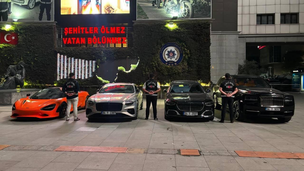 Luxury vehicles seized from Muhammed Yariz, chairman of Pusula Portfoy, are displayed after being seized as part of a market manipulation investigation in Istanbul, Türkiye, Sept. 24, 2026. (AA Photo)