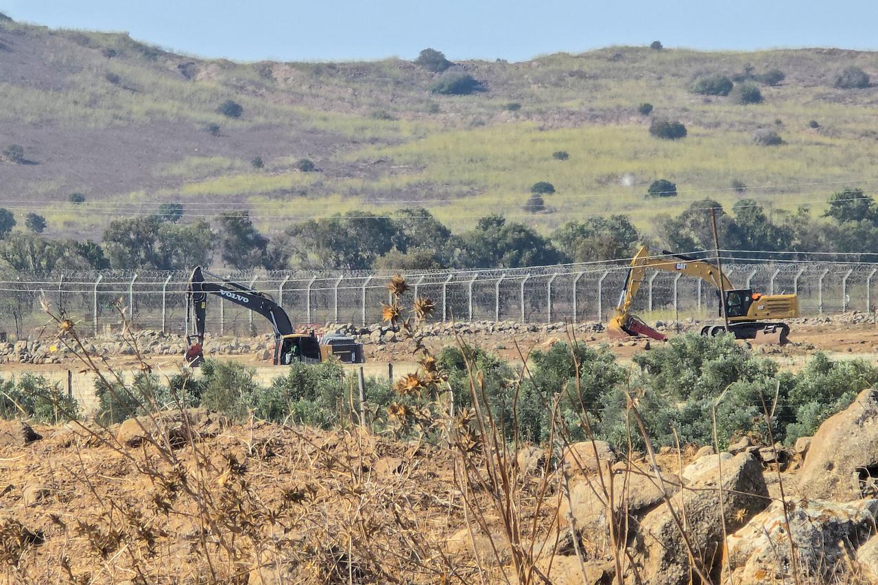 Israeli forces continue excavation activities with heavy machinery west of the village of Ashshe as part of the "Sufa 53" project, in Quneitra, Syria, on October 4, 2026. (AA Photo)