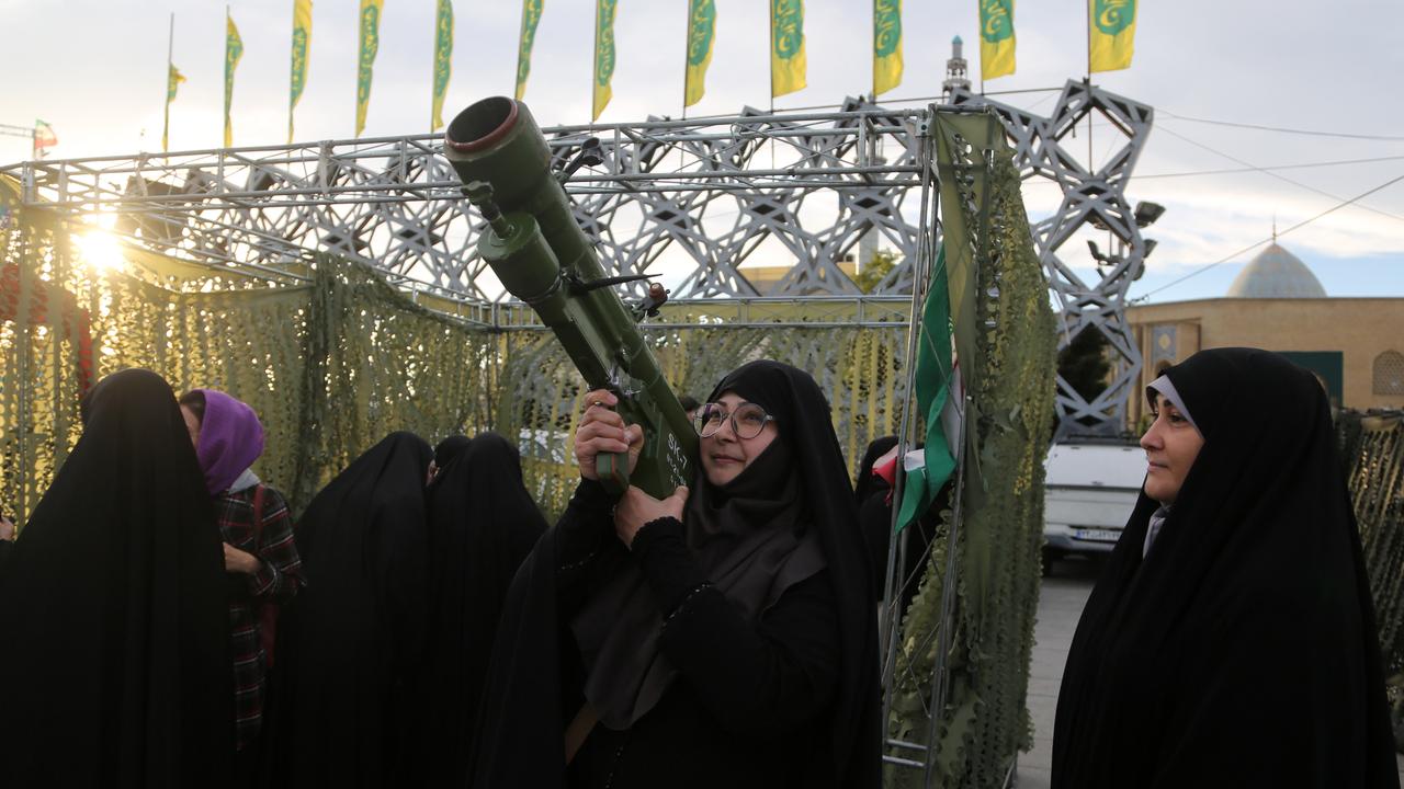Tehran women learn to shoot, fire rocket launchers in civilian training