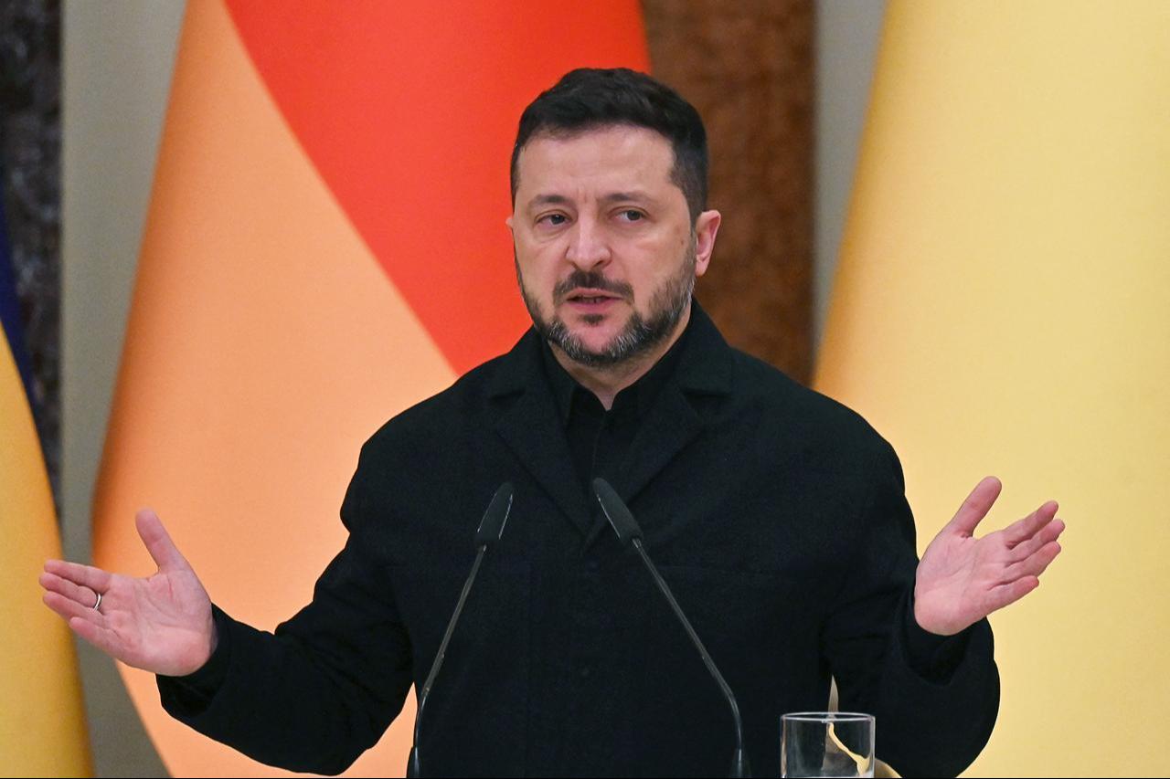 Ukraine's President Volodymyr Zelenskyy speaks during a press conference following talks with Germany's Chancellor in Mariinsky Palace following talks in Kyiv on October 4, 2026. (AFP Photo)