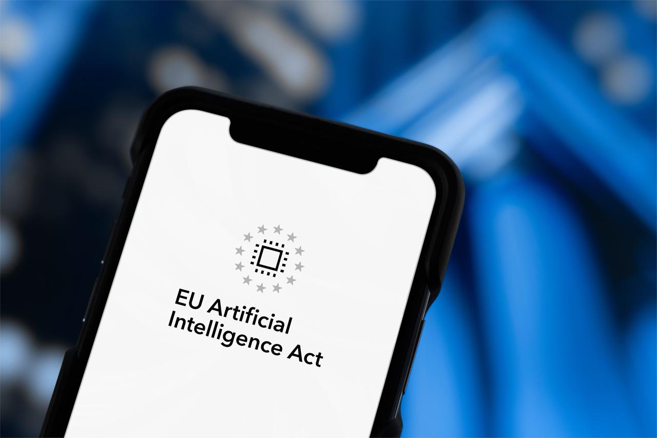 The European Union Artificial Intelligence Act is displayed on a smartphone screen in an illustrative image. (Photo via Adobe Stock)