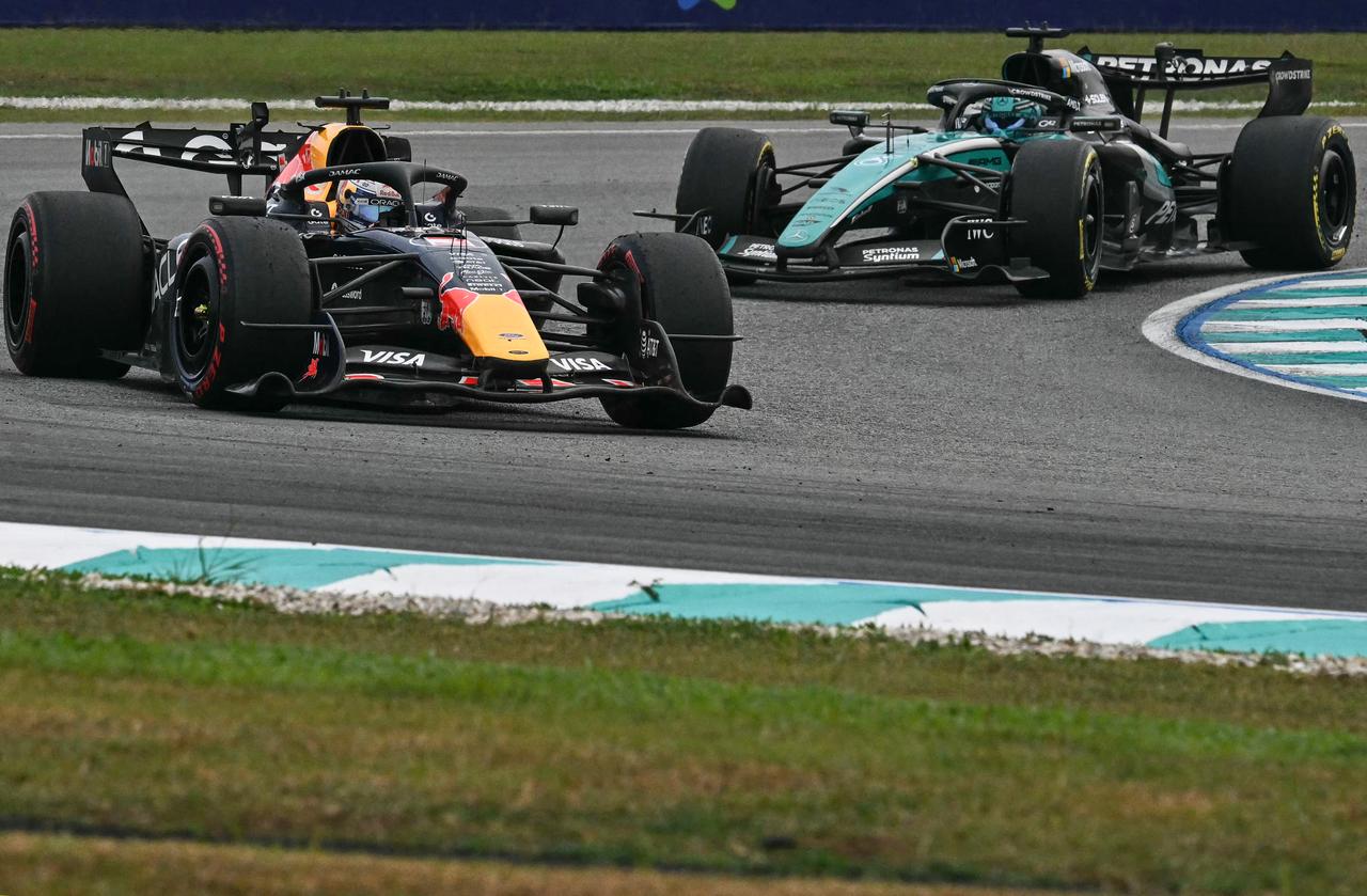 Red Bull Racing and Mercedes cars compete during the Gulf Air Bahrain Grand Prix at Sepang International Circuit in Sepang, Malaysia, Oct. 4, 2026. (AFP Photo)