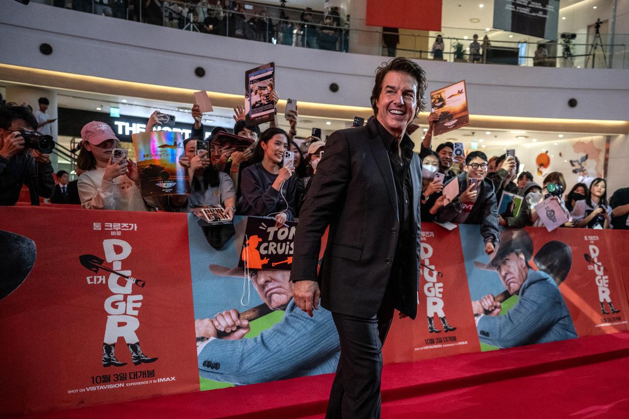 US actor Tom Cruise interacts with movie fans during the red carpet event for the film 'Digger' in Seoul on October 2, 2026. (AFP Photo)