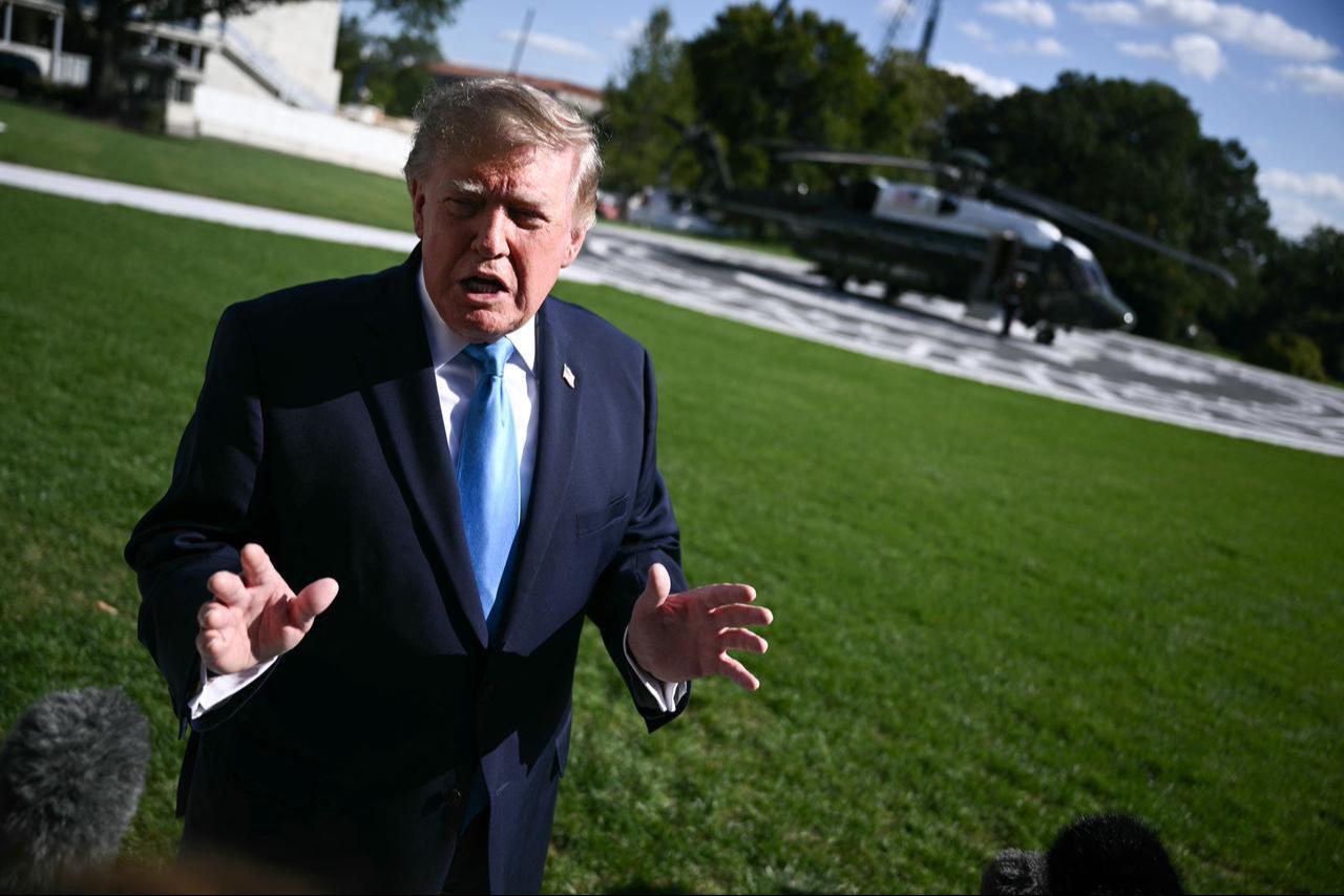 US President Donald Trump speaks to the press before departing from the South Lawn of the White House in Washington, DC, on October 5, 2026. (AFP Photo)