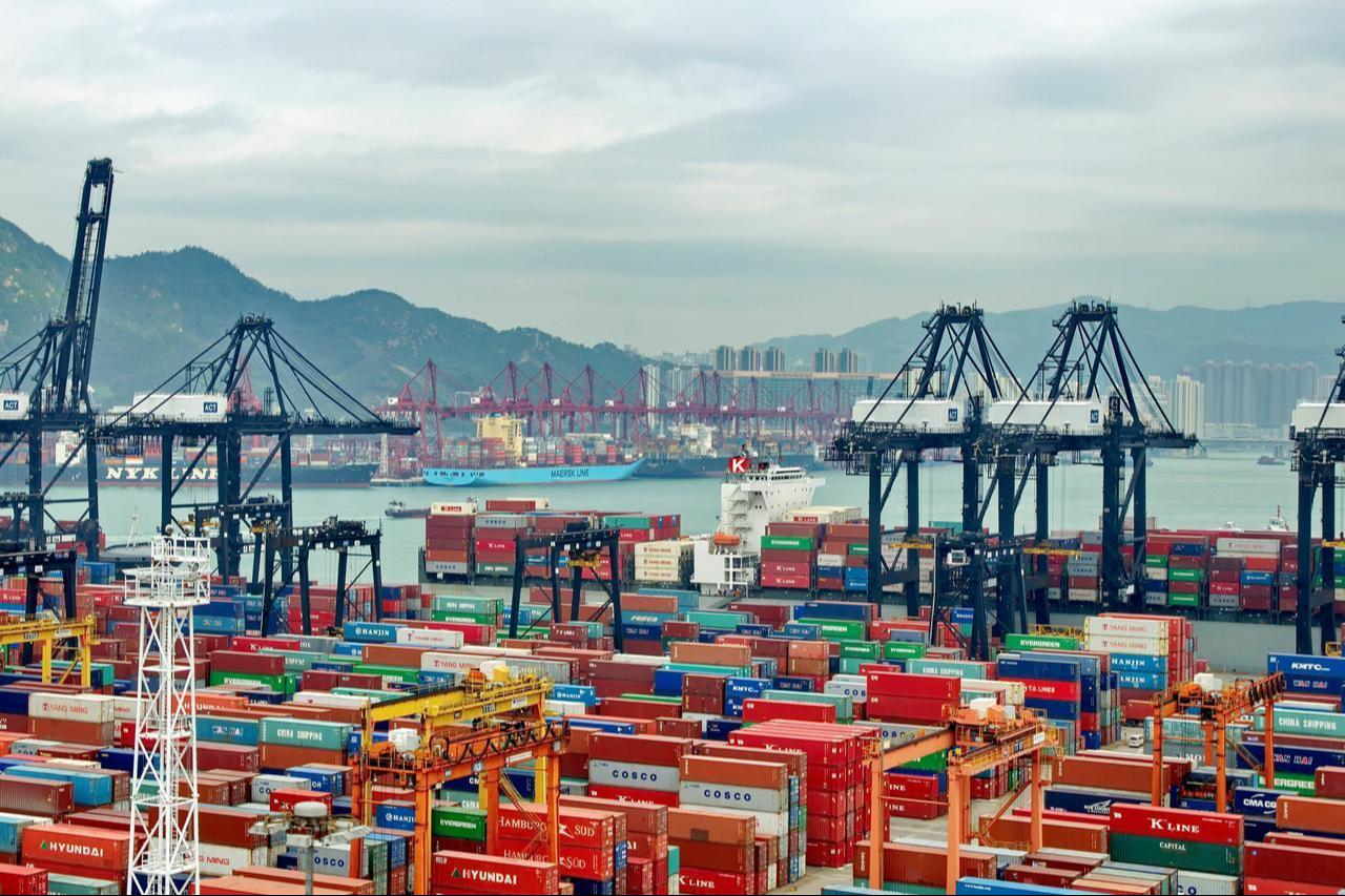 Shipping containers are stacked at Kwai Tsing Container Terminals in Hong Kong, China, May 13, 2013. (Adobe Stock Photo)